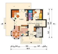 Оригинальный загородный дом с небольшим балконом и эркерами